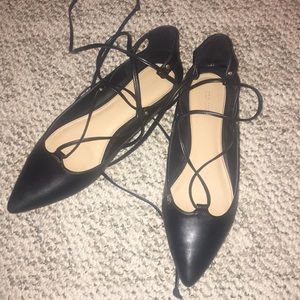 Black pointy flats